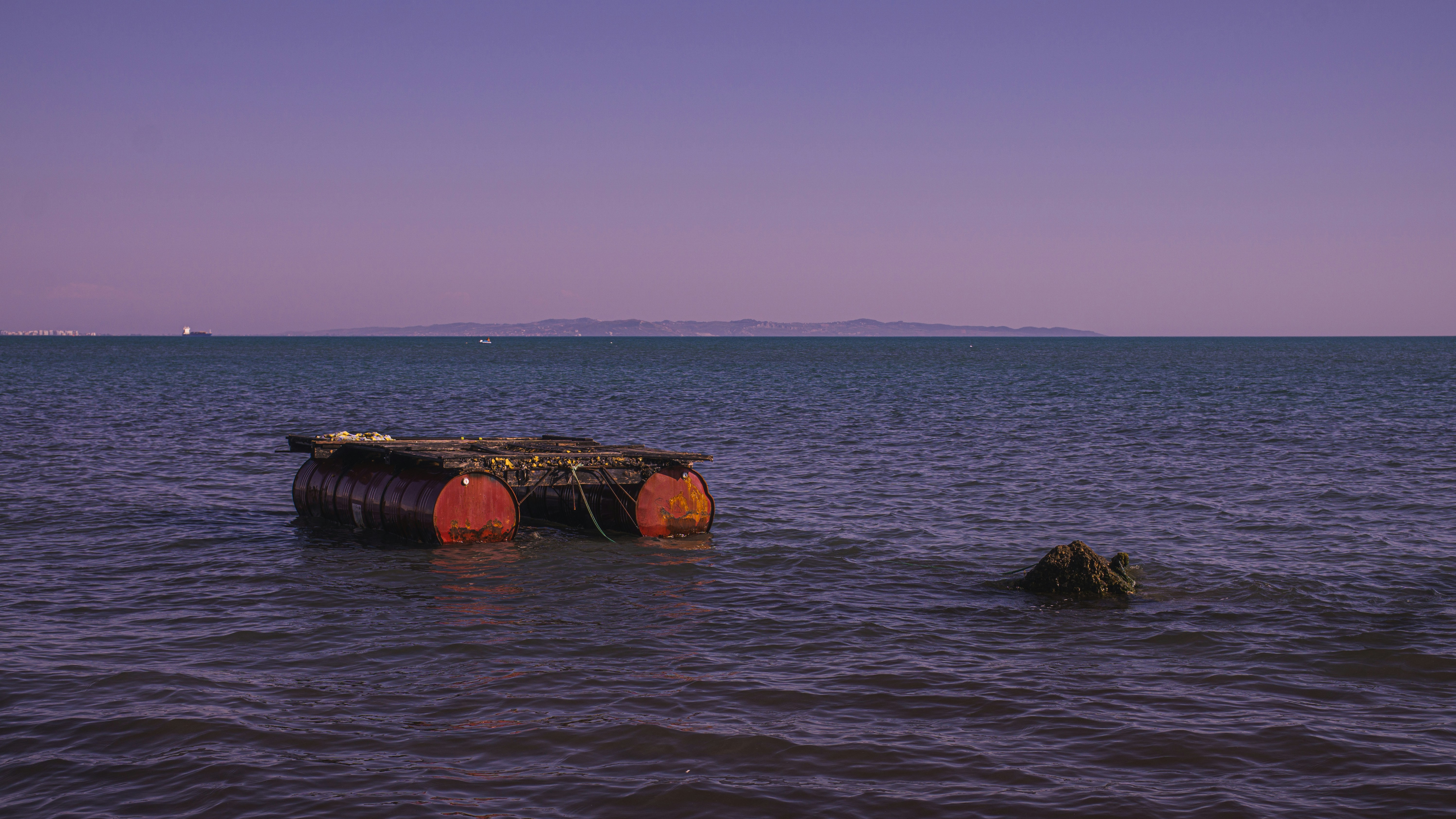Boat sailing on a calm sea typical of seasonal maritime activities along the coast