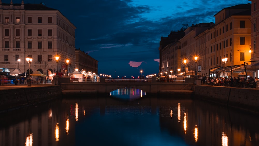 a body of water with buildings around it