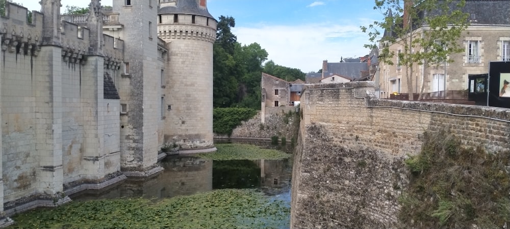 a stone wall with a tower