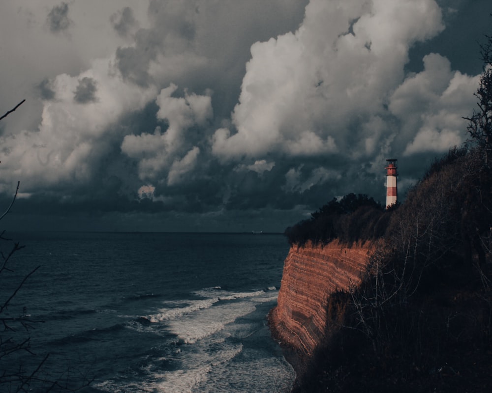 a lighthouse on a cliff