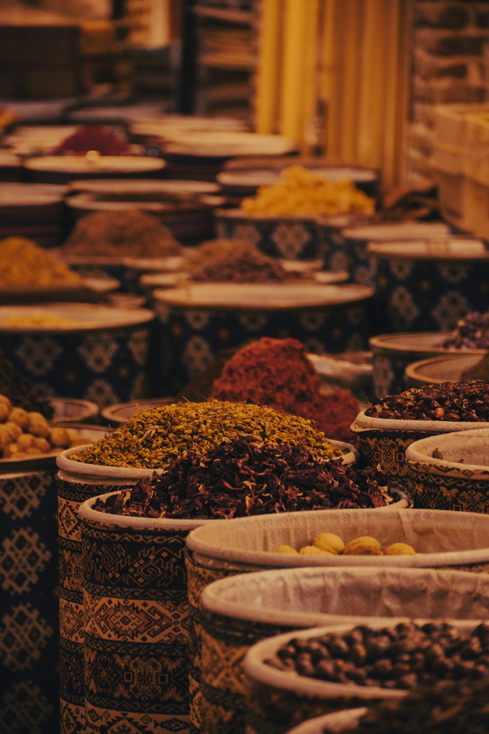 a group of bowls full of spices