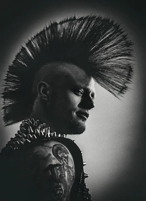 A mohawk hairstyle silhouette against a graffiti wall, showcasing the band's youthful spirit.