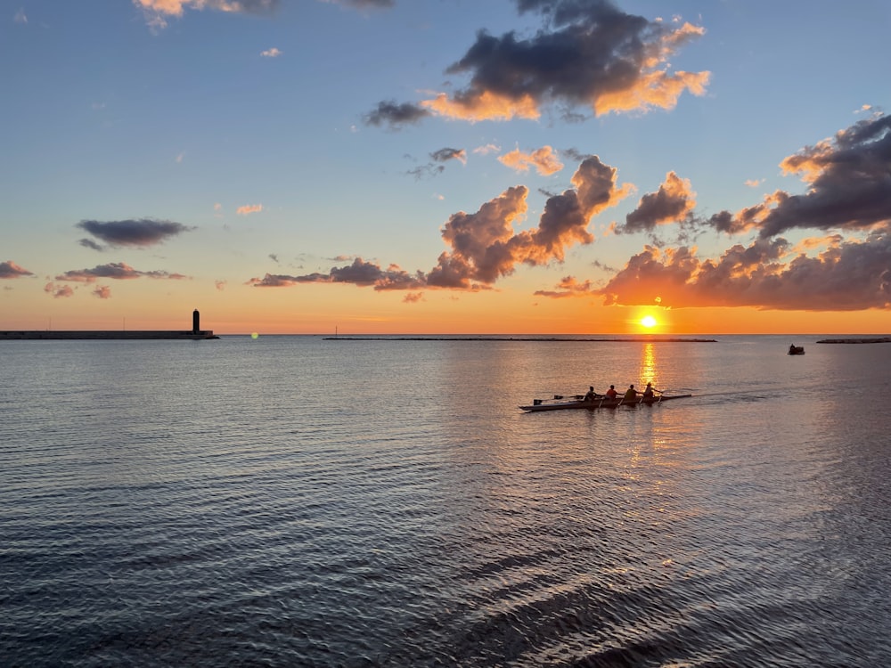 a sunset over a body of water