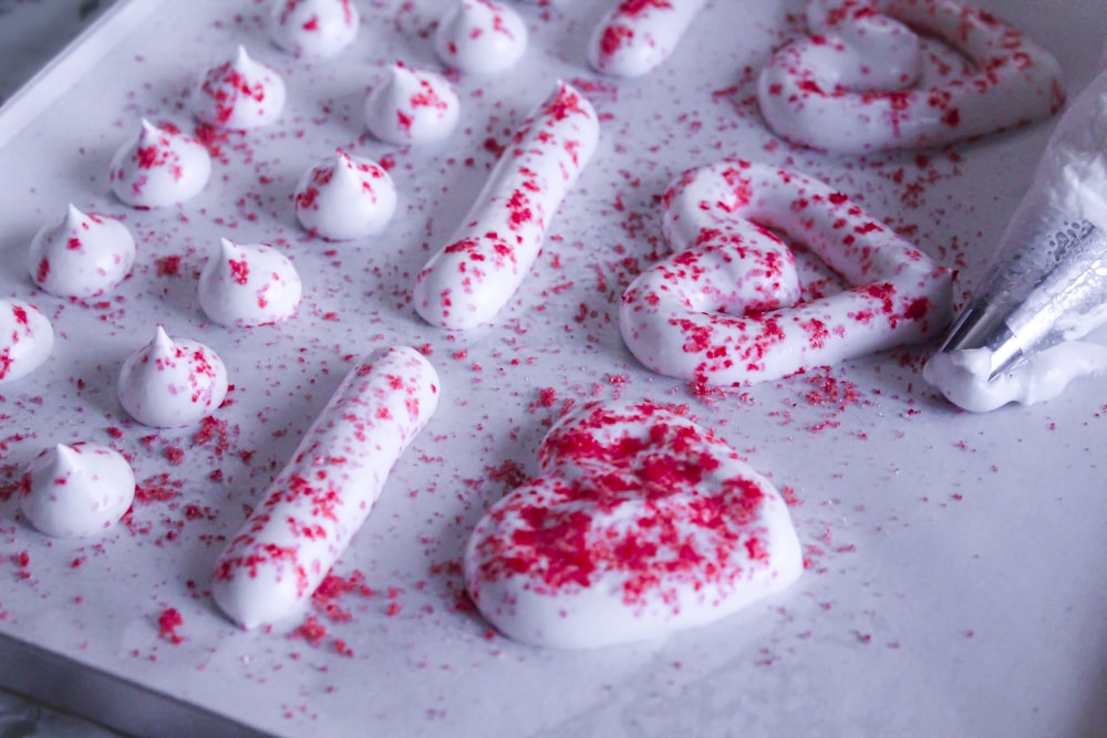 a group of heart shaped cookies