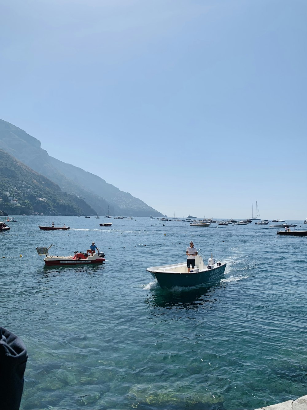 a group of boats in the water