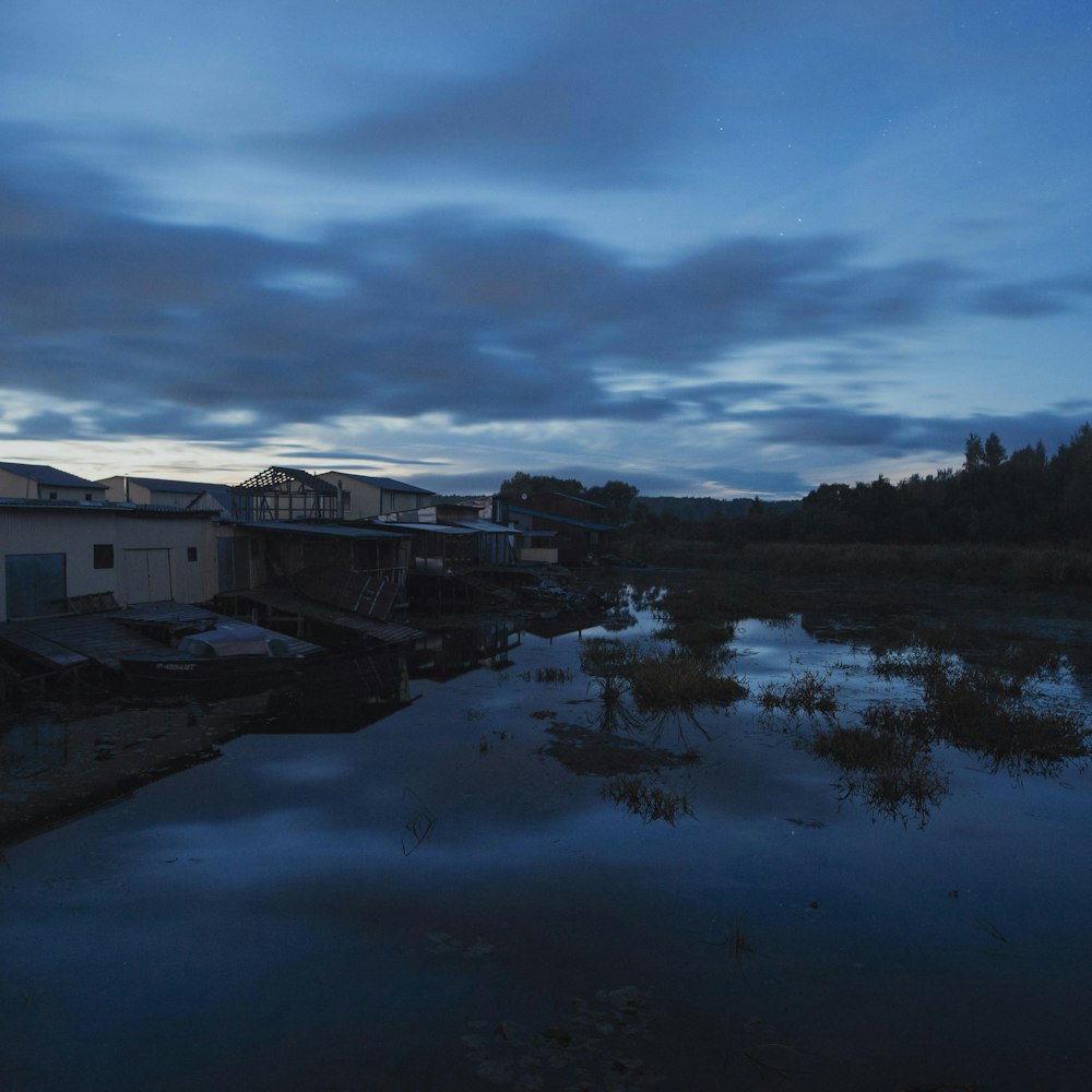 a body of water with buildings along it