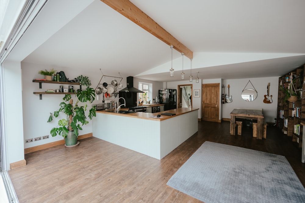 a kitchen with a wood floor