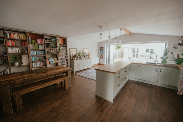 A bright kitchen with modern cabinets and a welcoming dining area.