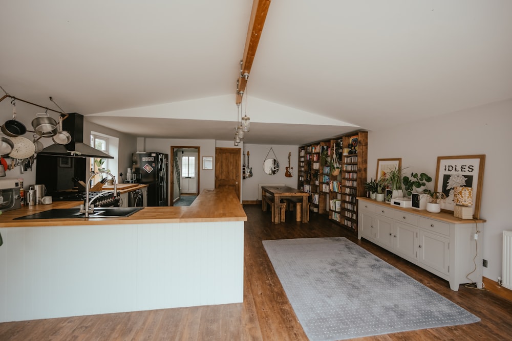 a kitchen with a rug