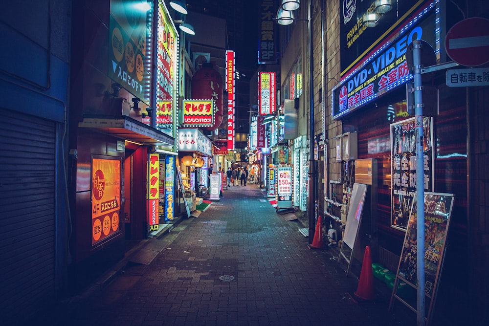 a street with signs and lights