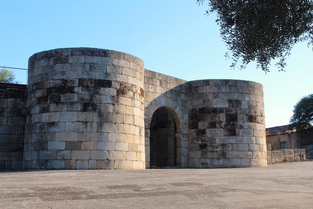 a stone wall with a door