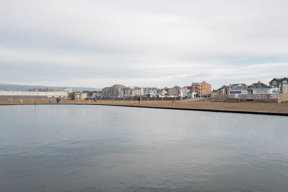 a body of water with buildings along it