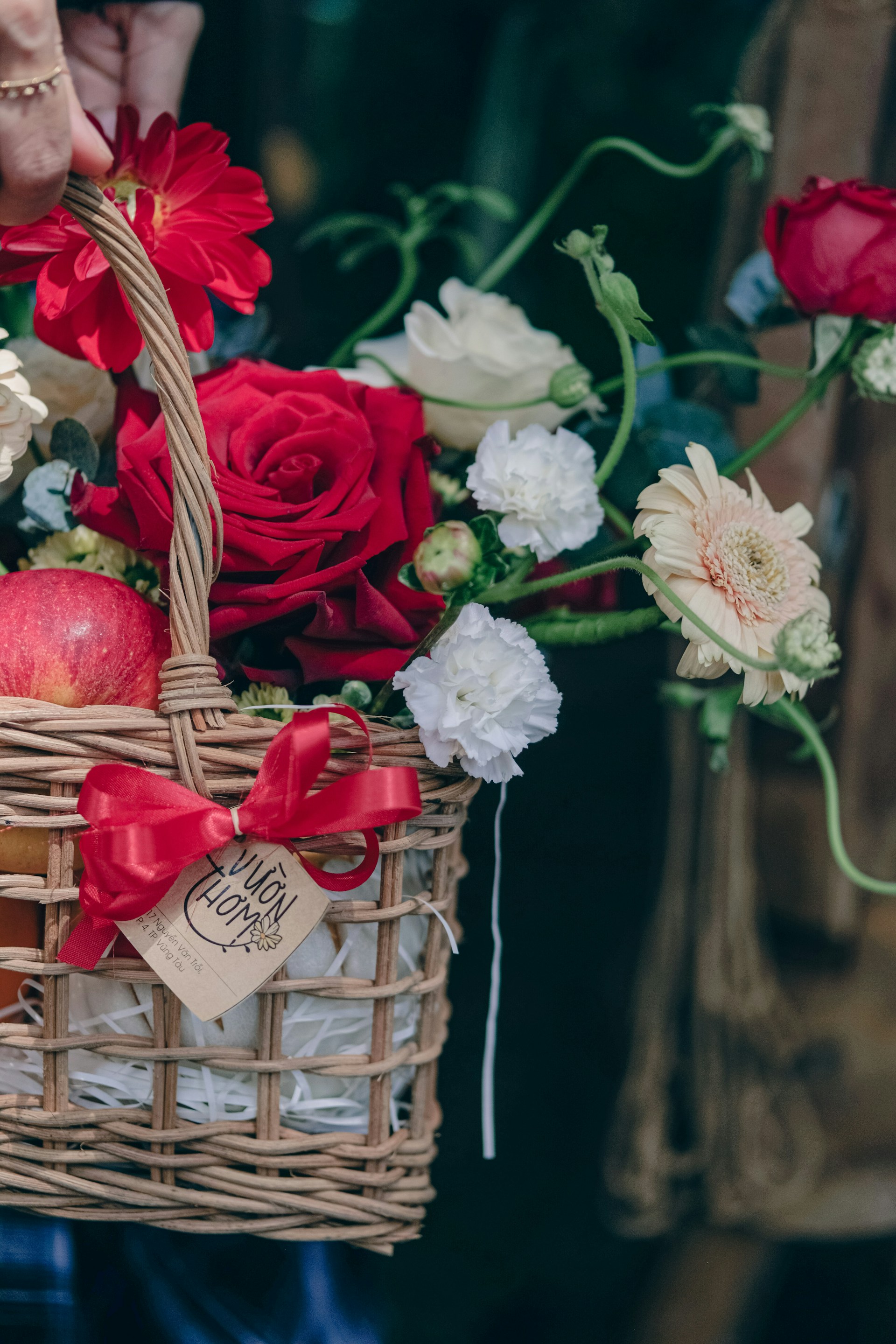 person wearing grey knit sweater