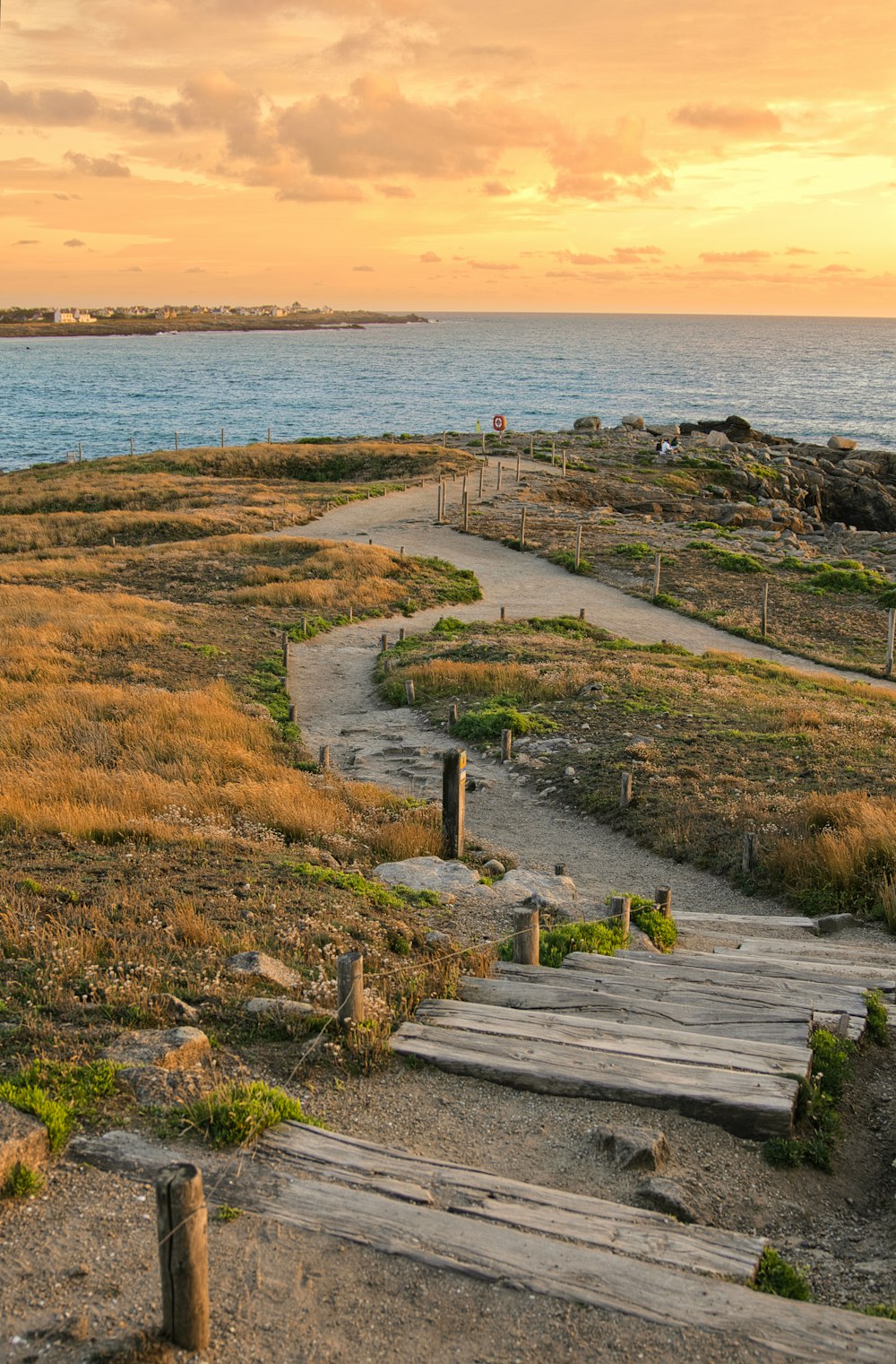 a path leading to a beach