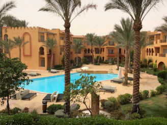 a pool in front of a building
