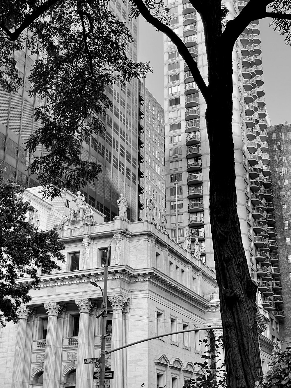 a building with columns and a statue