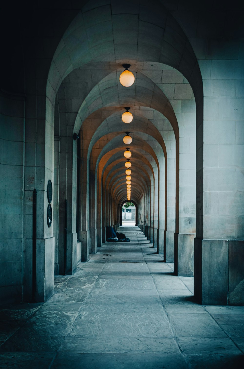 a hallway with light fixtures