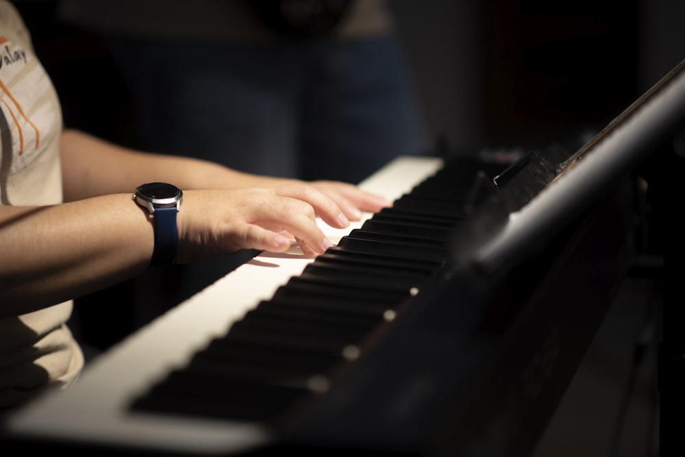 a person playing a piano