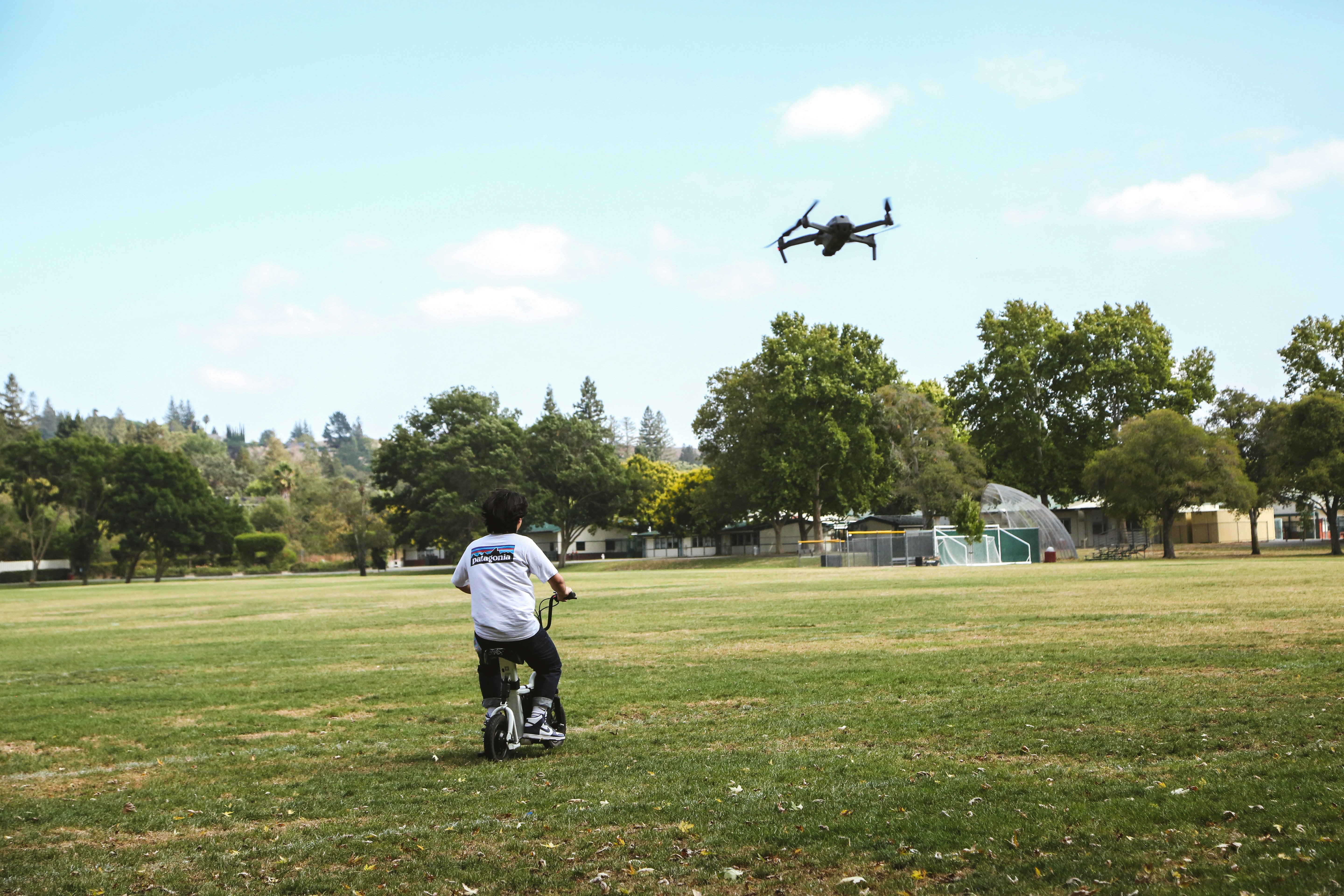 a man running towards a helicopter