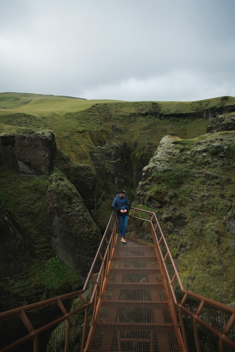 a person walking on a bridge