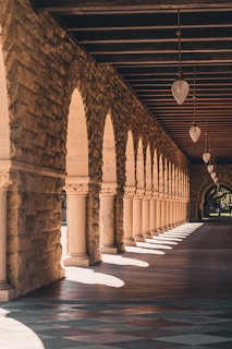 a hallway with stone walls
