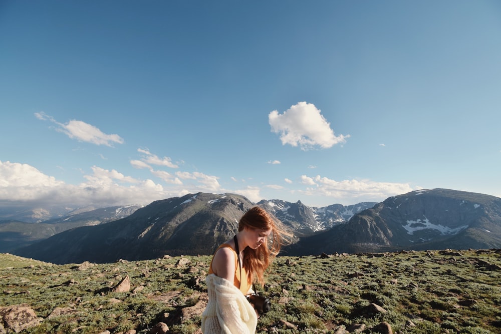 a person standing on a hill