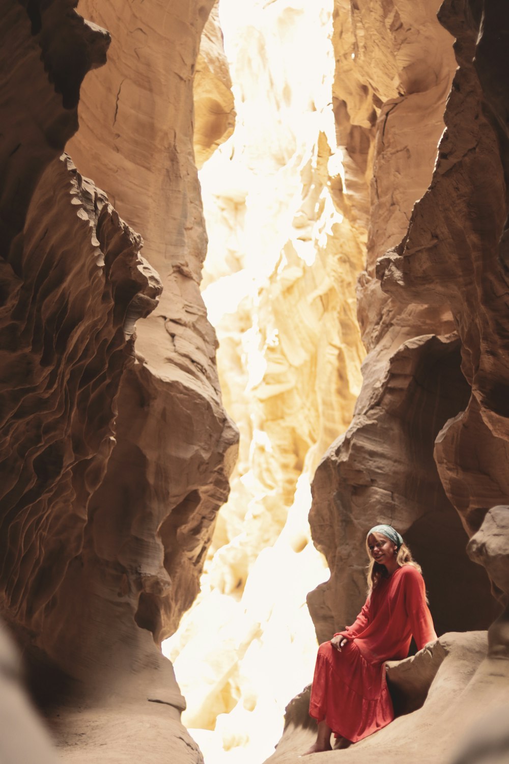 a person standing in a cave