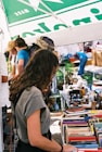 a person looking at books