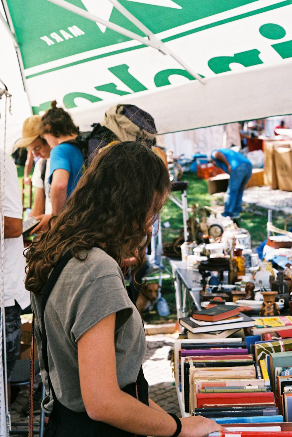 a person looking at books