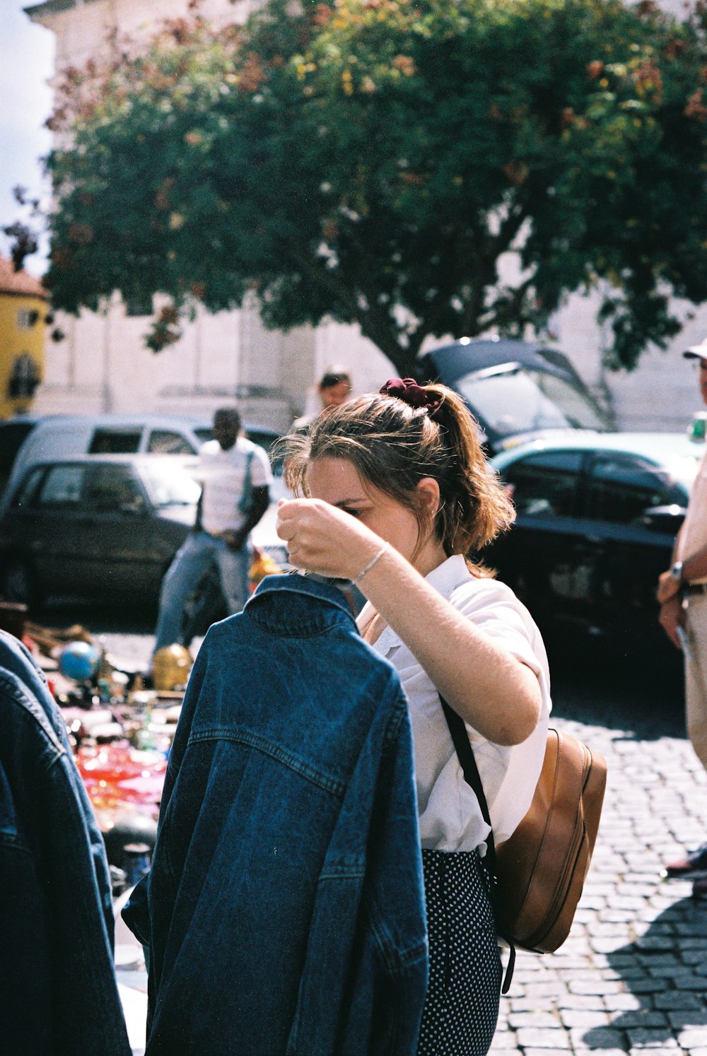 a woman kissing a man on the cheek