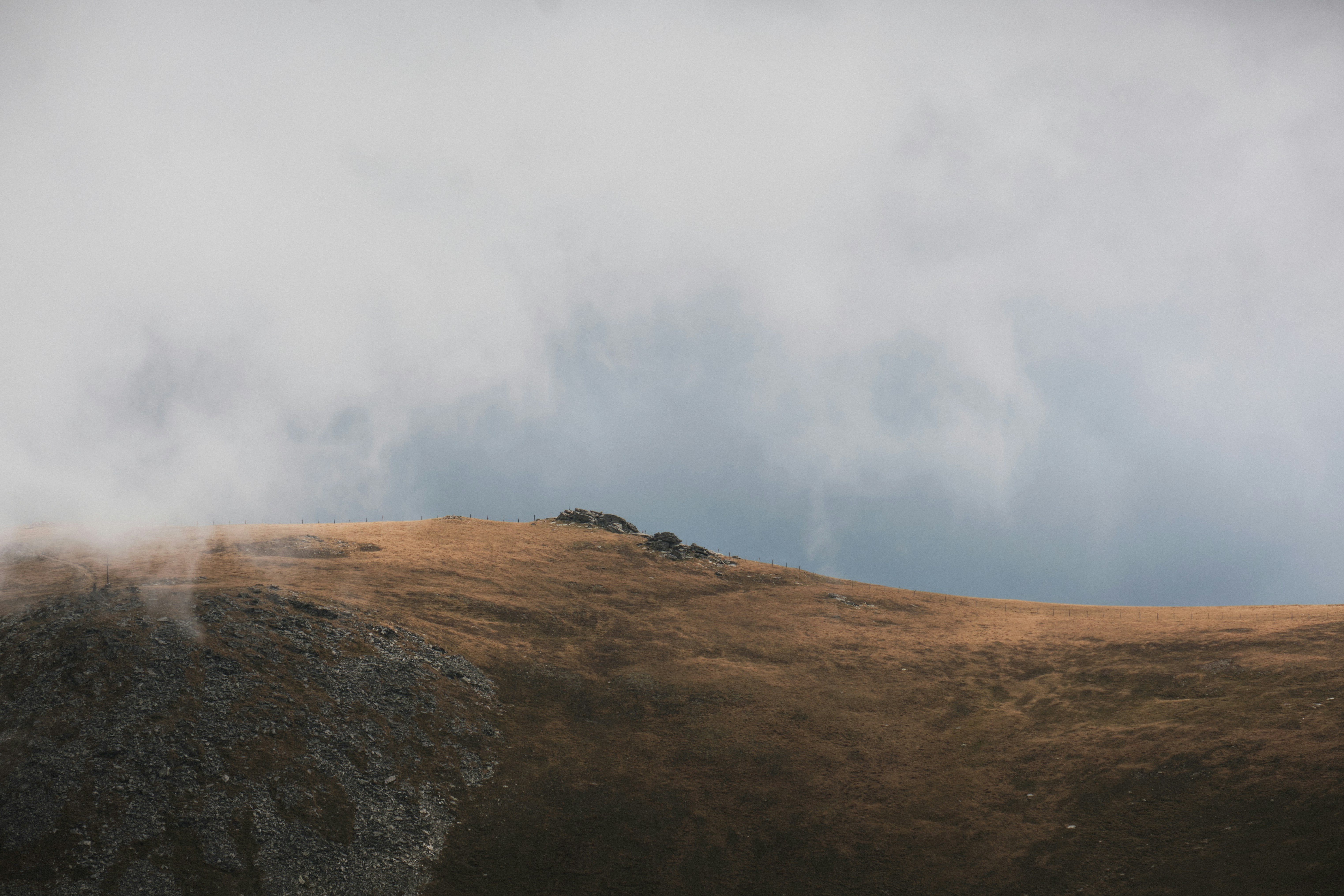 a hill with a large mound of dirt on it