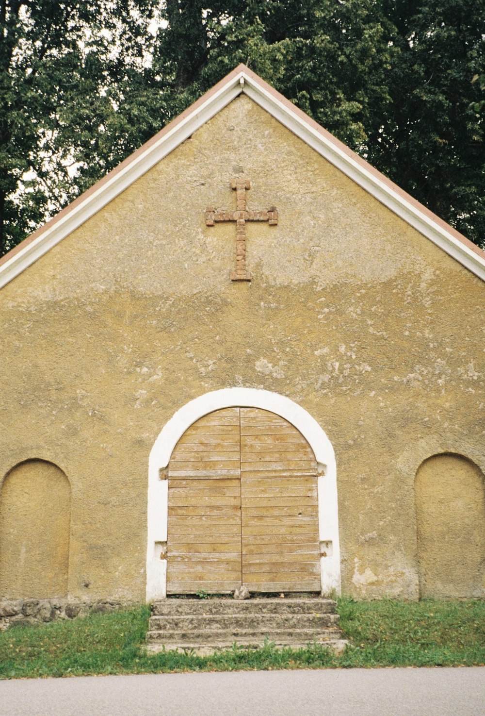 a door with a cross on it