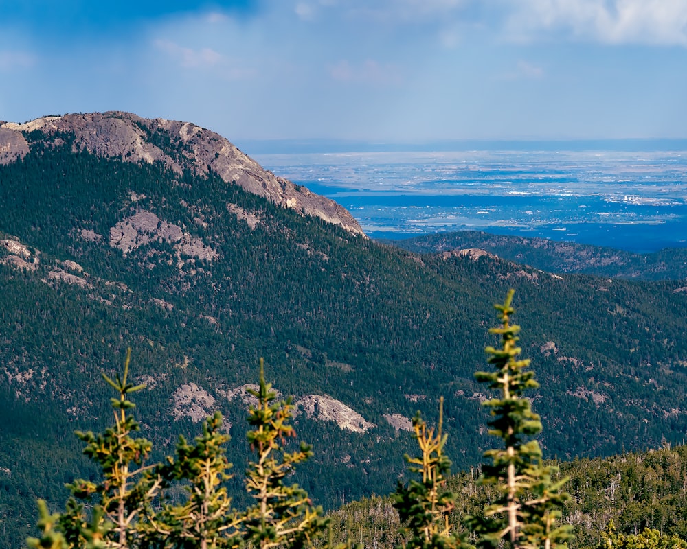 a view of a mountain range and the ocean