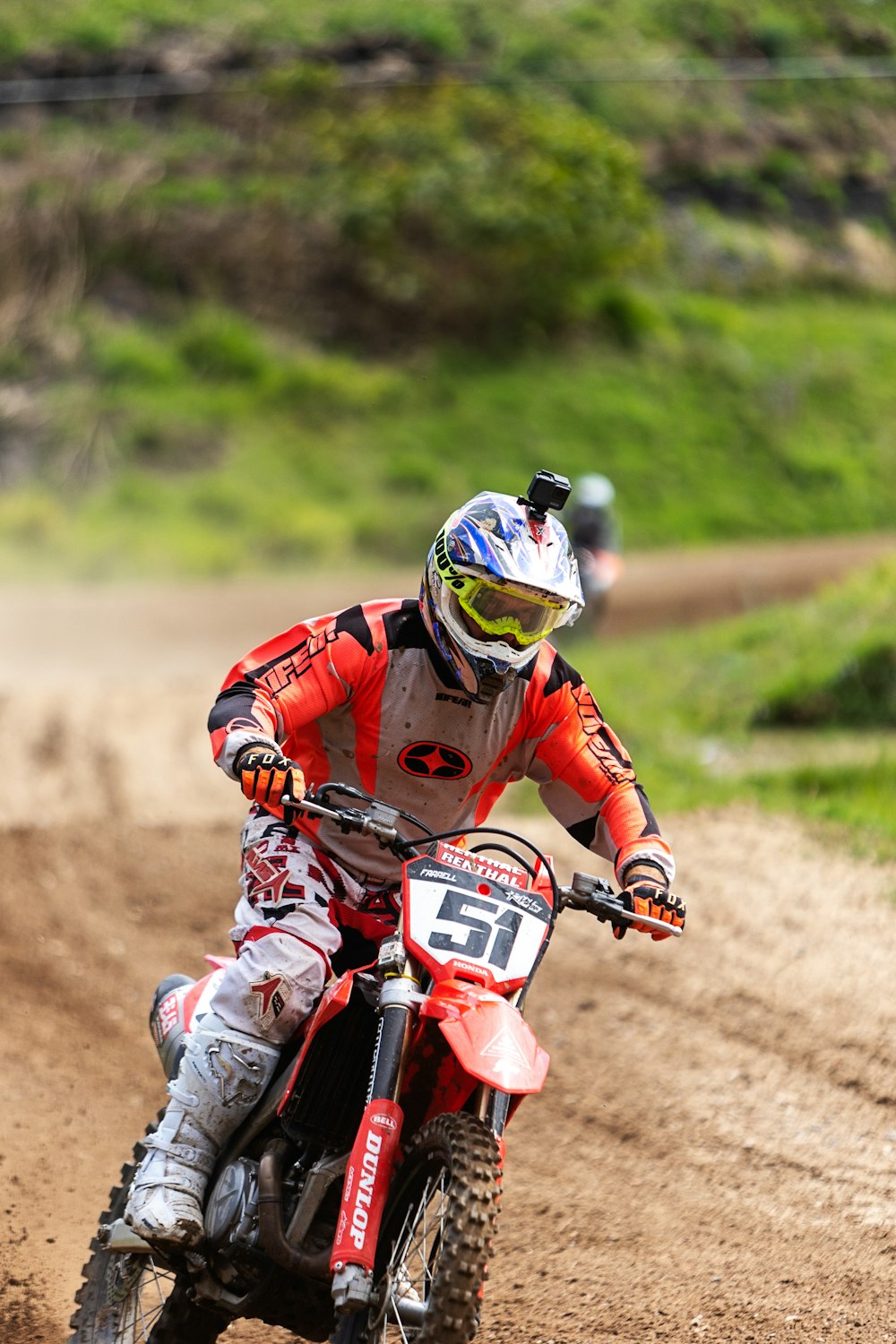 a man riding a dirt bike