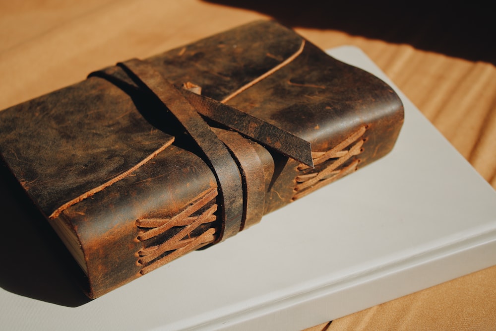 a brown leather wallet