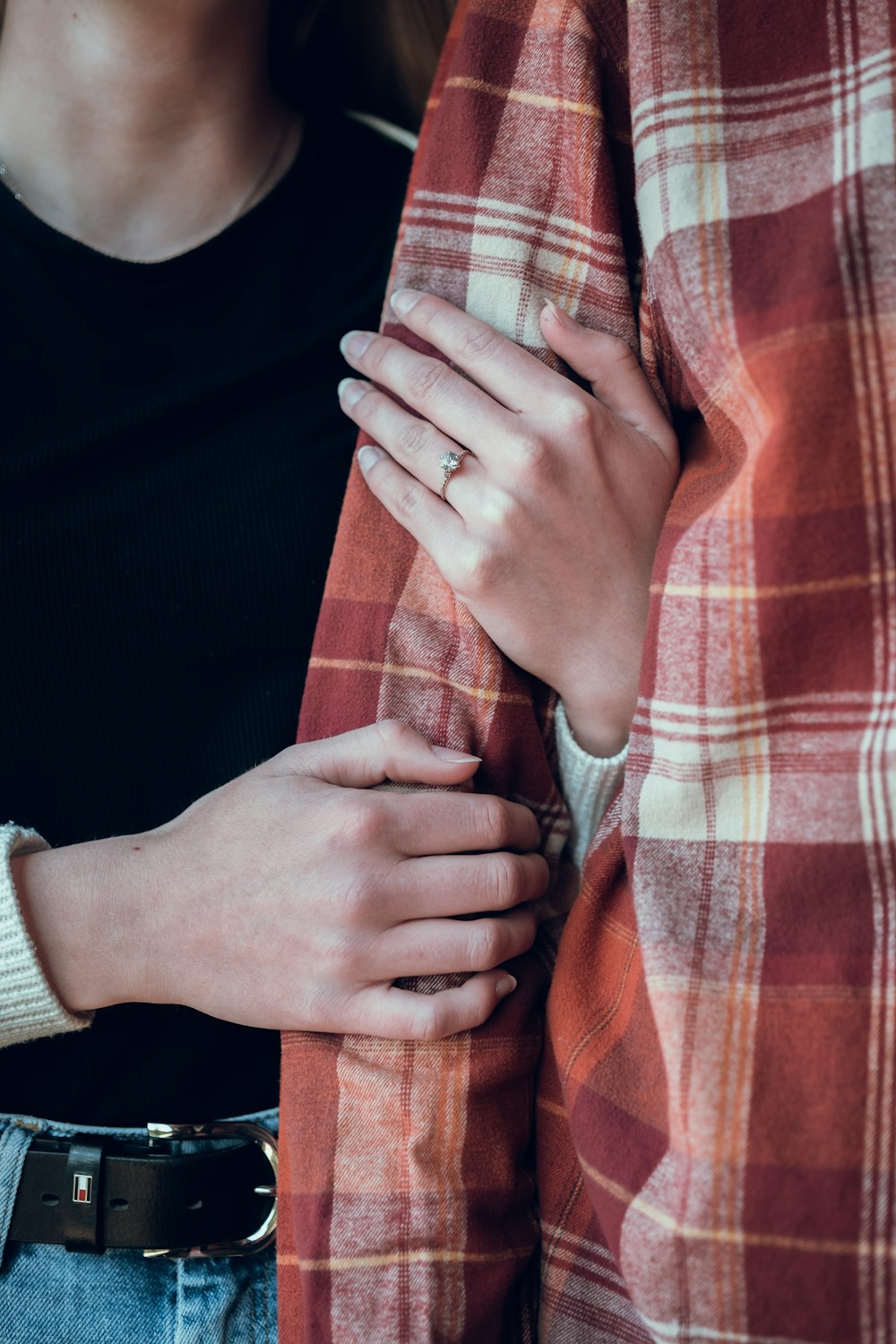 a person holding the hands together