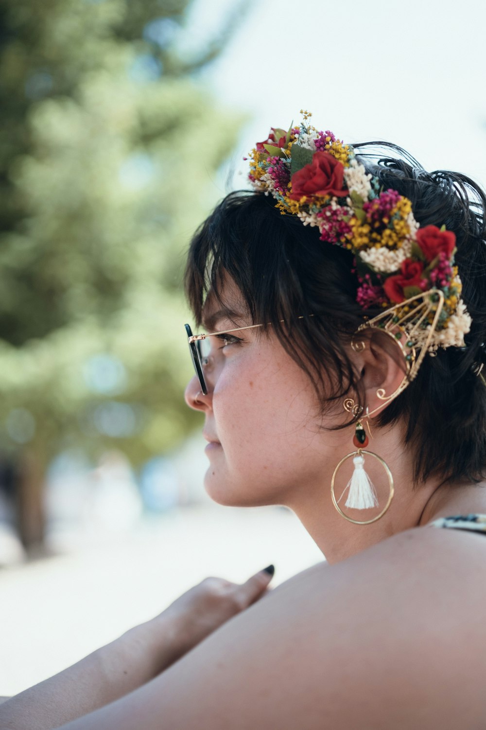 a woman with flowers in her hair