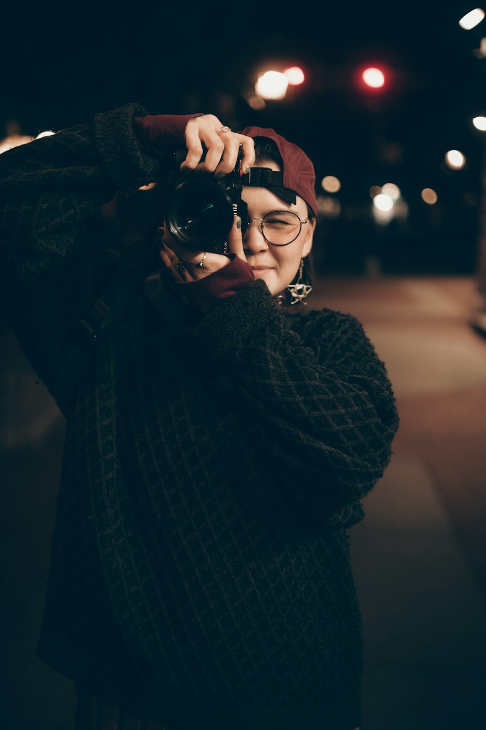 a woman holding a camera