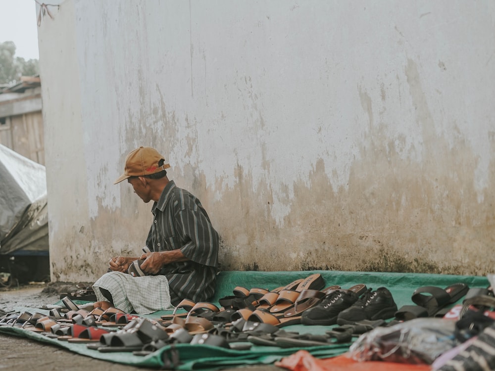 a man sitting on the ground
