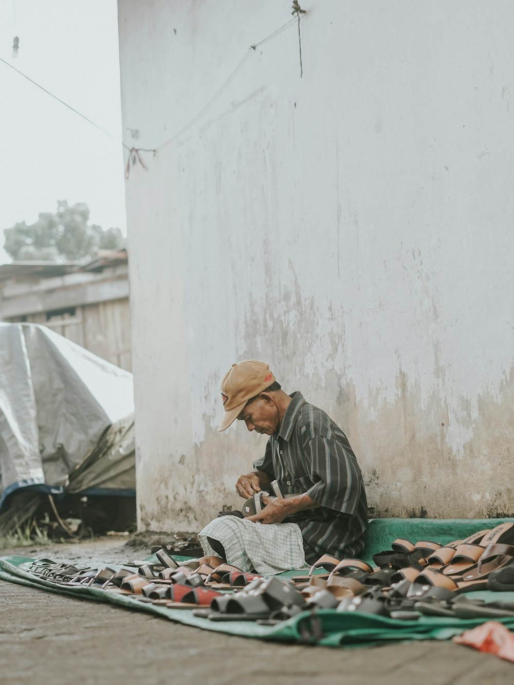 a man sitting on the ground