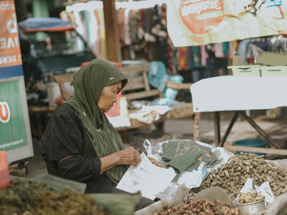 a person in a green head scarf