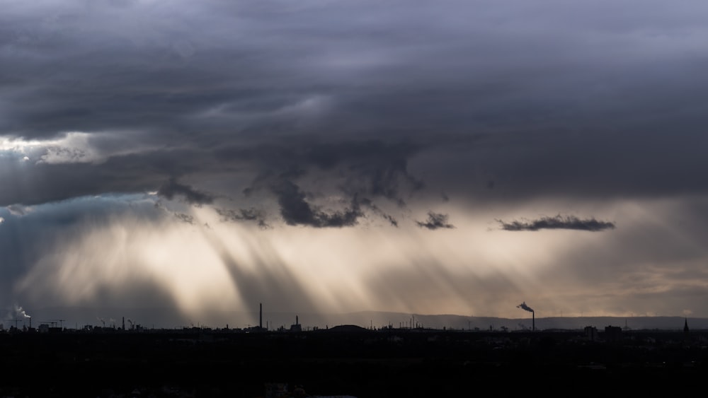 a cloudy sky over a city