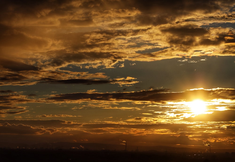 a sunset over a city