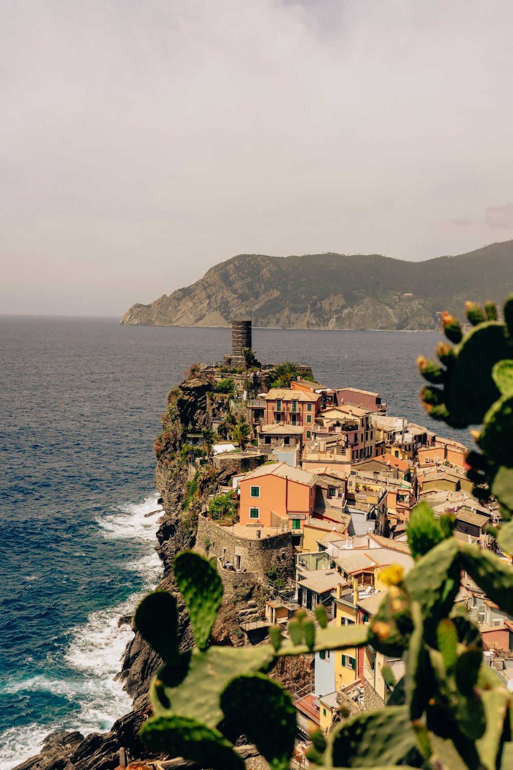 a town on a cliff by the water