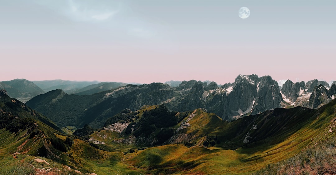 a mountain range with snow,