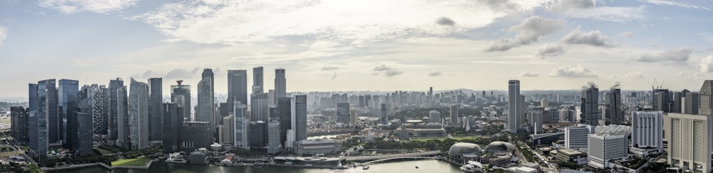 a city skyline with a river