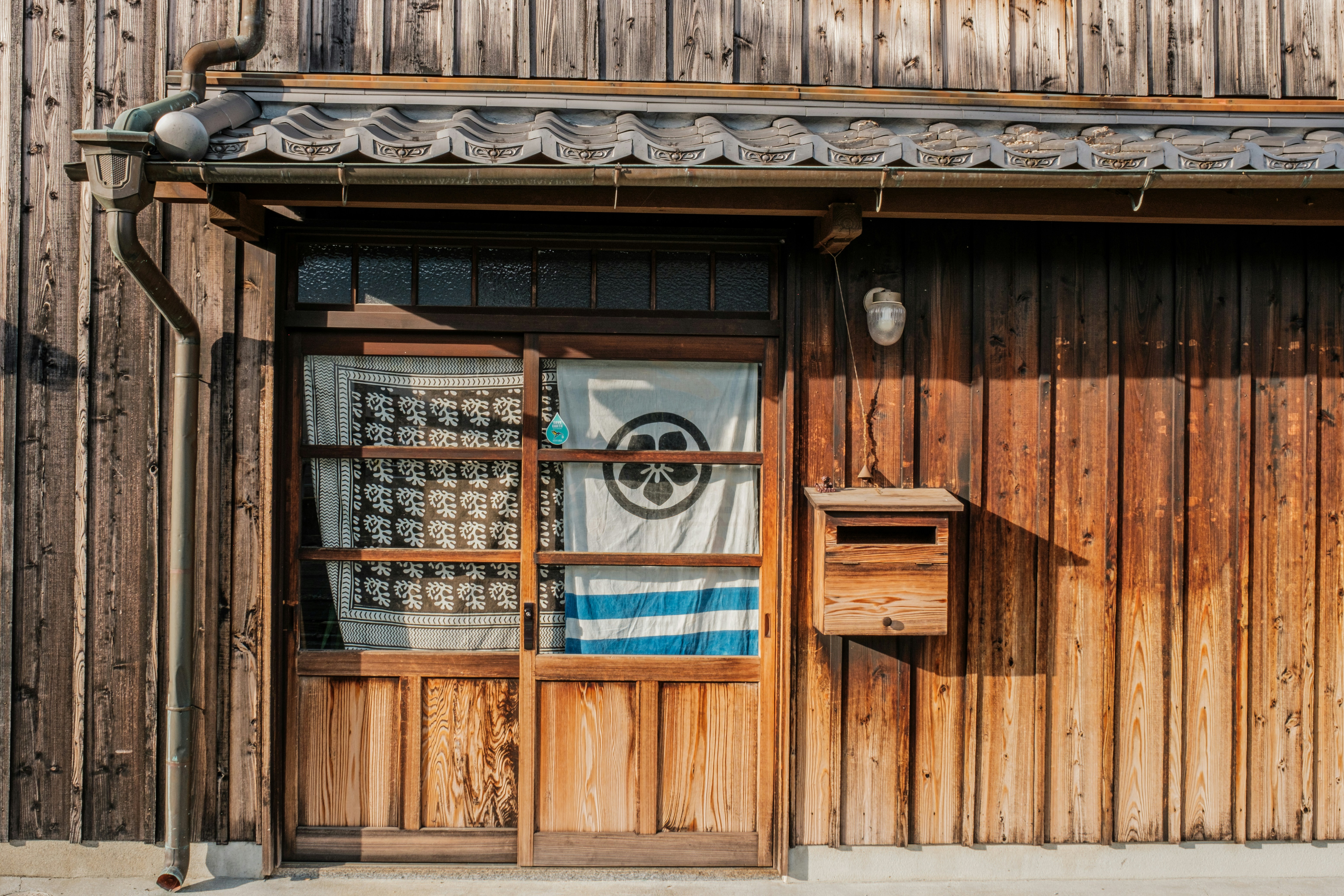 a wood building with a window, 