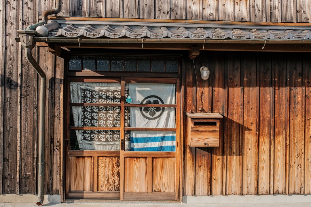 a wood building with a window,