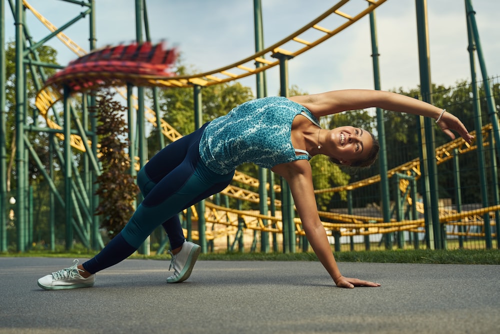 a man doing a handstand on a playground