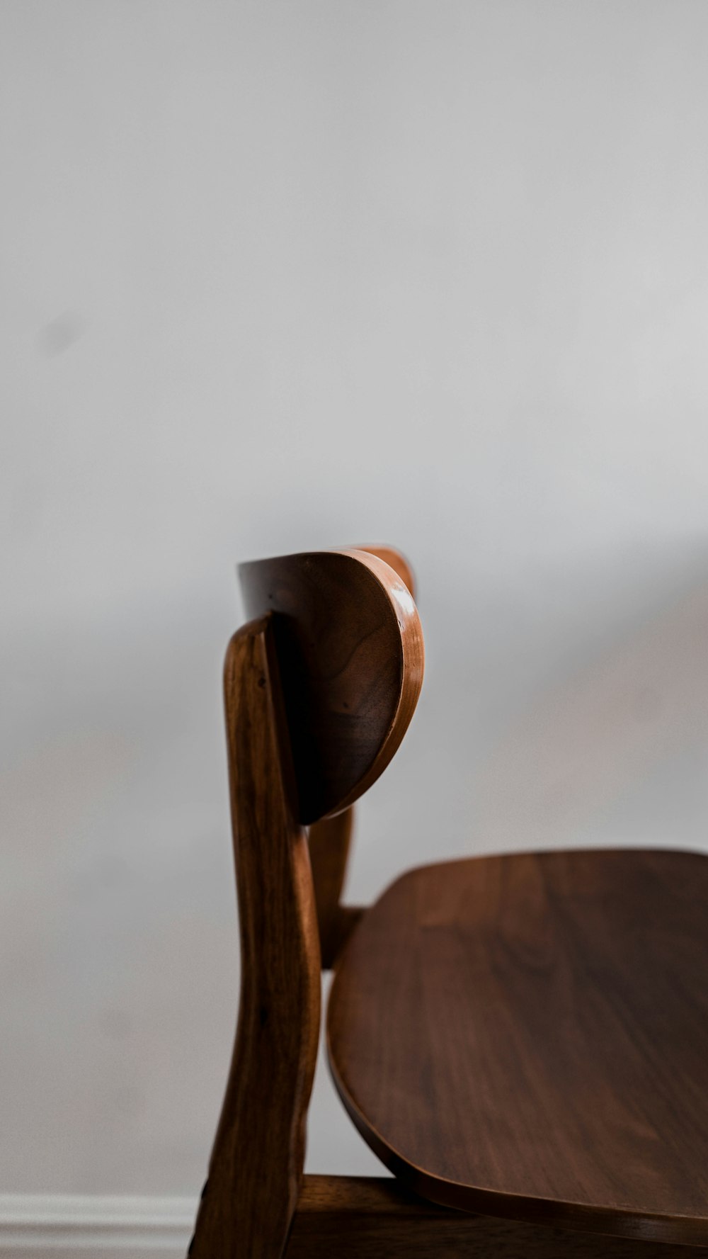 a wooden chair with a handle